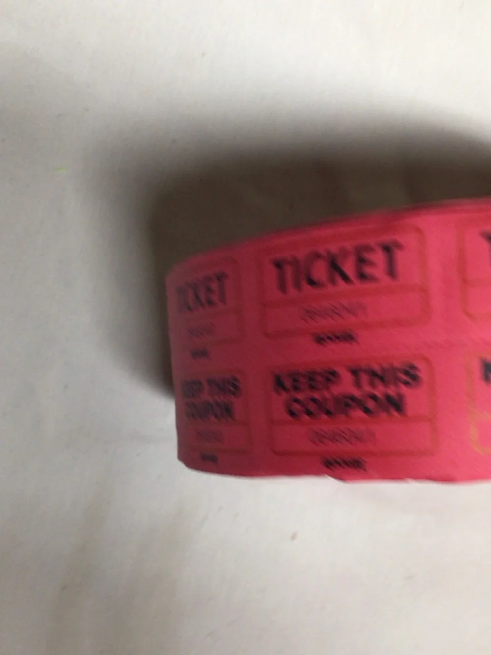 Source Unknown Red Raffle Ticket Roll with Black Print